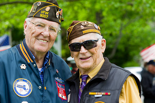 Two smiling U.S. veterans in uniform